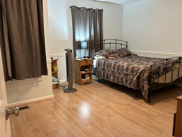 1125 Turkey Foot Rd Unit 3, Lexington, KY 40502 - bedroom with wood finished floors and baseboards