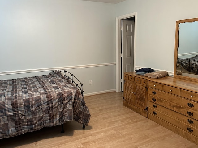 1125 Turkey Foot Rd Unit 3, Lexington, KY 40502 - bedroom with light wood-style floors and baseboards