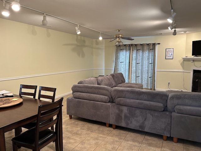 1125 Turkey Foot Rd Unit 3, Lexington, KY 40502 - living room featuring track lighting, light tile patterned flooring, and a ceiling fan
