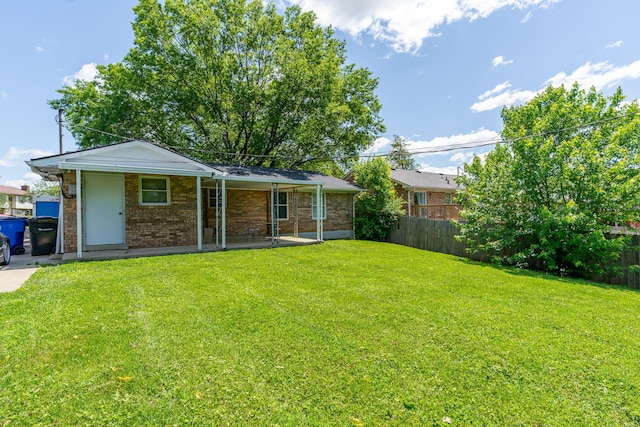2812 Winter Park Dr, Lexington, KY 40517 - rear view of house with brick siding and a patio