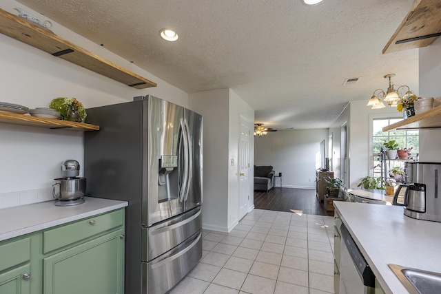 753 Woodhaven Pl, Lexington, KY 40514 - kitchen with stainless steel appliances, green cabinetry, open shelves, light countertops, and recessed lighting