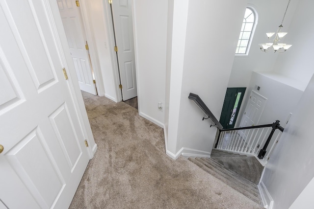 753 Woodhaven Pl, Lexington, KY 40514 - stairway with carpet, a chandelier, and baseboards