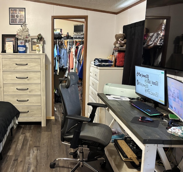 27 Dishman Ln, Monticello, KY 42633 - office with dark wood-type flooring, a textured ceiling, and ornamental molding