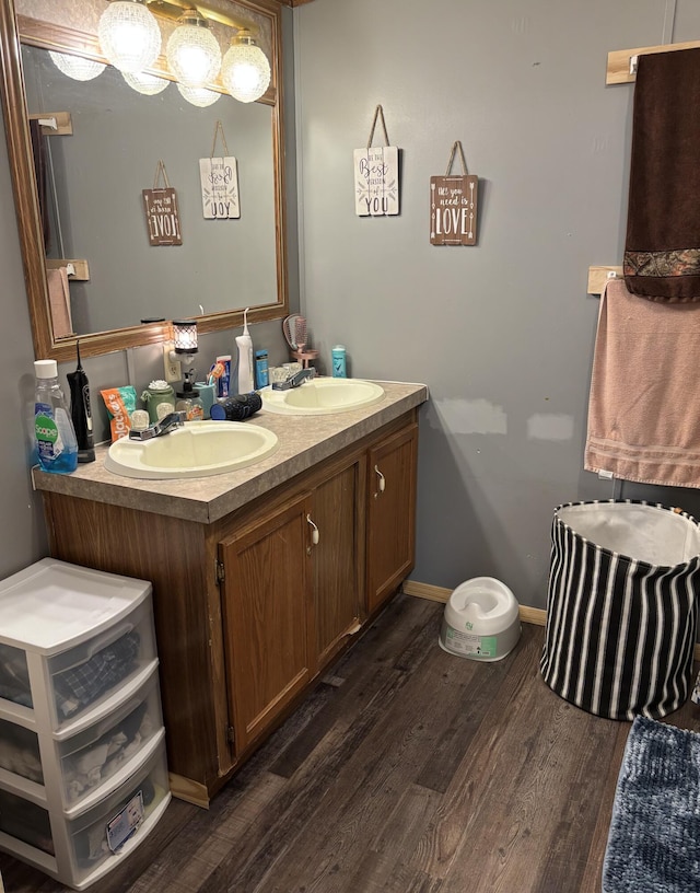 27 Dishman Ln, Monticello, KY 42633 - bathroom with double vanity and wood finished floors