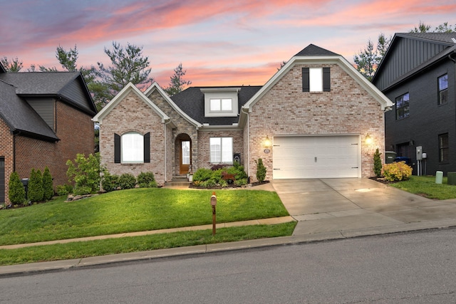 4291 Captains Ct, Lexington, KY 40513 - traditional home with a lawn, driveway, brick siding, and an attached garage