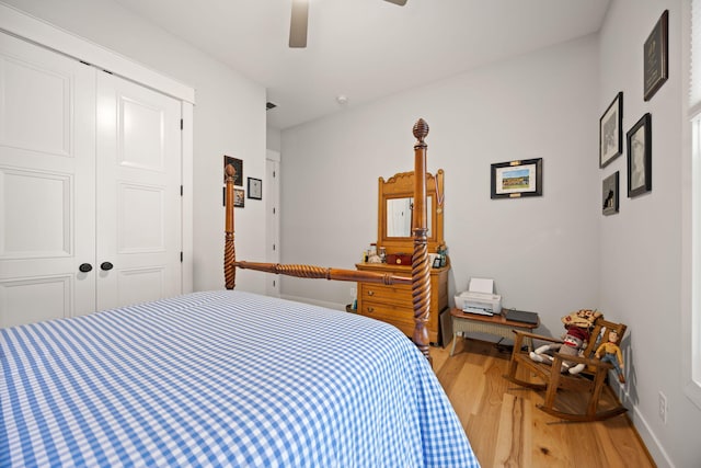 4291 Captains Ct, Lexington, KY 40513 - bedroom featuring light wood finished floors, a closet, and ceiling fan