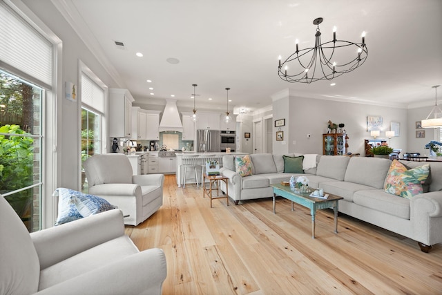 4291 Captains Ct, Lexington, KY 40513 - living room with a chandelier, light wood finished floors, crown molding, and recessed lighting