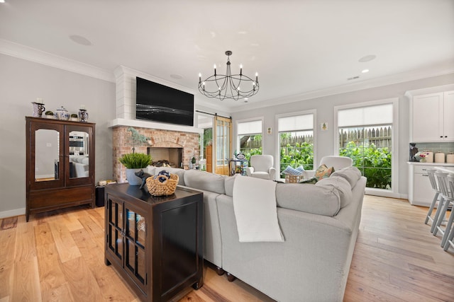 4291 Captains Ct, Lexington, KY 40513 - living area featuring ornamental molding, a chandelier, light wood-type flooring, and a brick fireplace