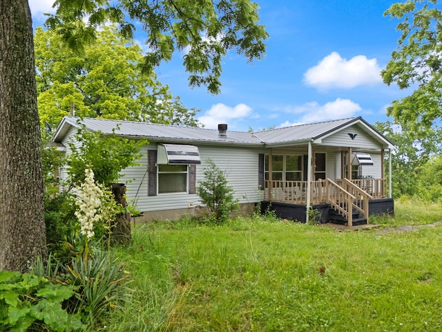 2125 High Reeves Spur 1, Richmond, KY 40475 - view of front of house featuring a porch and a metal roof
