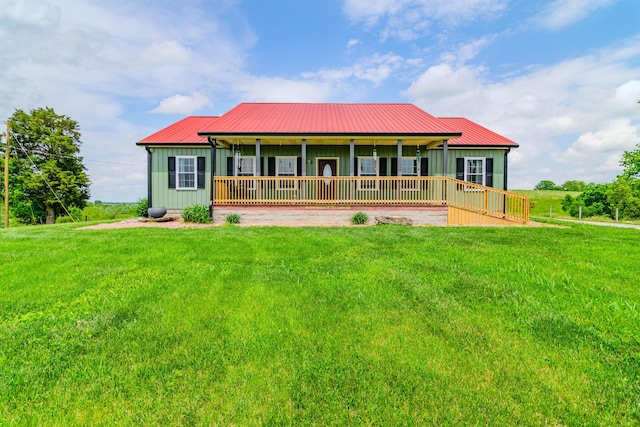 3900 Upper Sharpsburg, Carlisle, KY 40311 - view of front of property featuring a porch, a front yard, board and batten siding, and metal roof