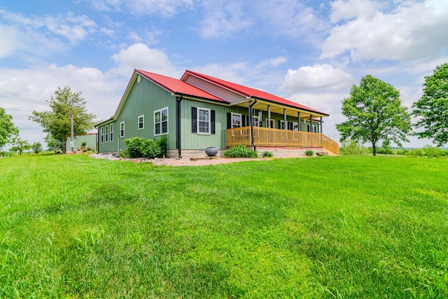 3900 Upper Sharpsburg, Carlisle, KY 40311 - view of property exterior featuring a yard, covered porch, and metal roof