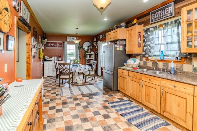 3900 Upper Sharpsburg, Carlisle, KY 40311 - kitchen with a sink, freestanding refrigerator, light brown cabinets, glass insert cabinets, and pendant lighting