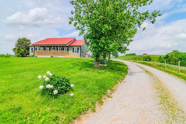 3900 Upper Sharpsburg, Carlisle, KY 40311 - view of front of home with a front lawn, gravel driveway, metal roof, and a porch