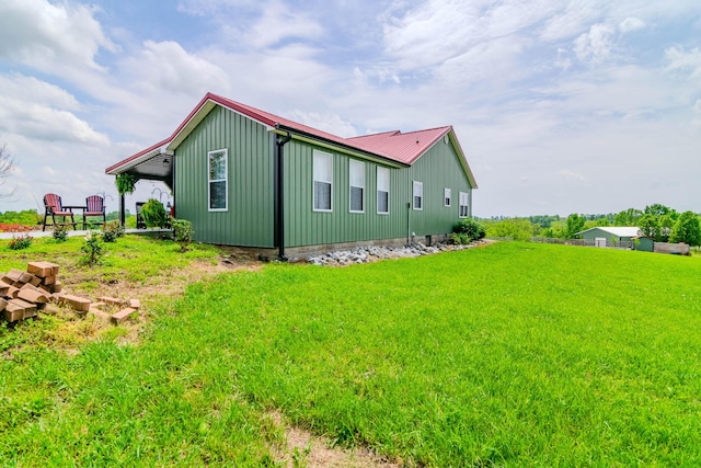 3900 Upper Sharpsburg, Carlisle, KY 40311 - view of property exterior with metal roof and a lawn