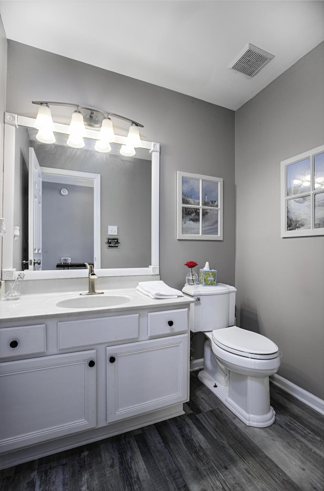 113 Bramble Ct, Nicholasville, KY 40356 - half bath featuring toilet, wood finished floors, vanity, and baseboards