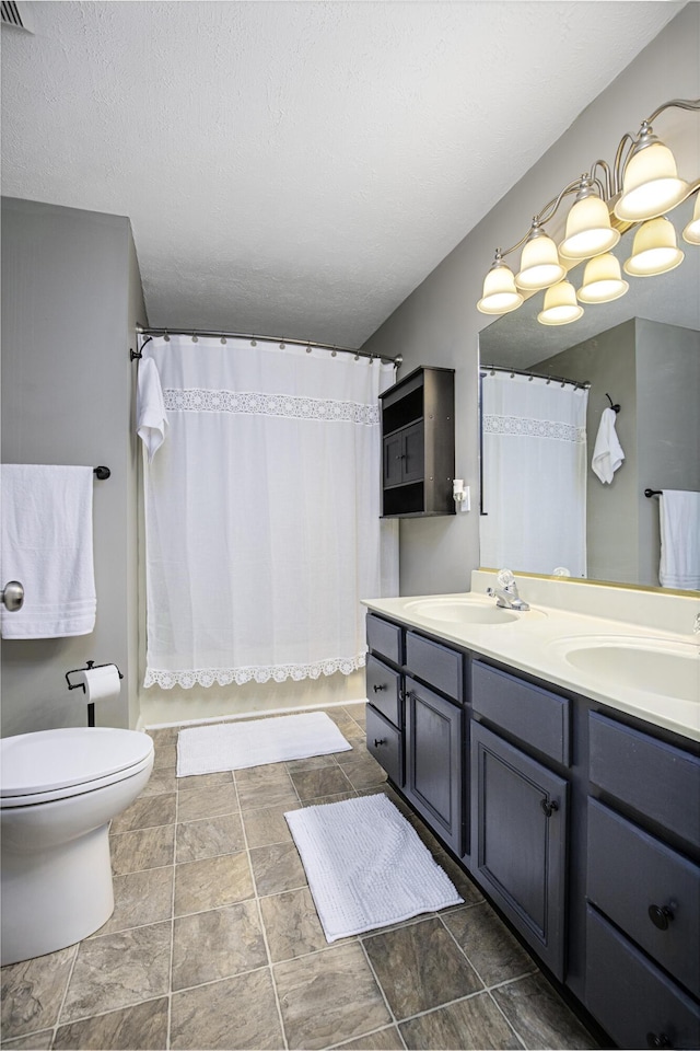 113 Bramble Ct, Nicholasville, KY 40356 - full bath featuring toilet, double vanity, and stone finish flooring