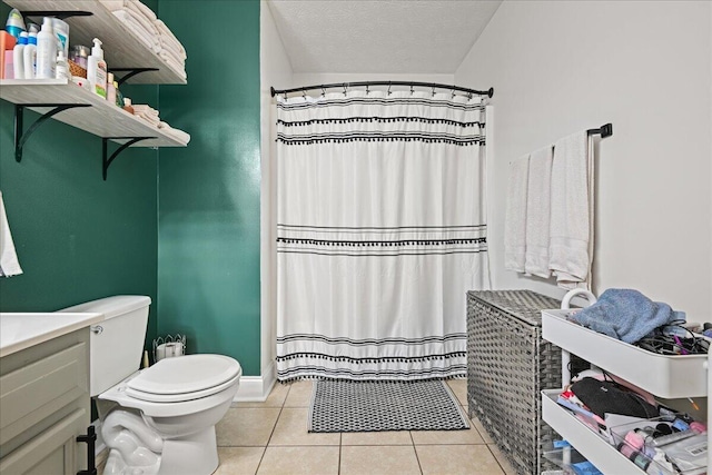 1008 Ramsey Branch Rd, Artemus, KY 40903 - full bath featuring toilet, tile patterned floors, vanity, and curtained shower