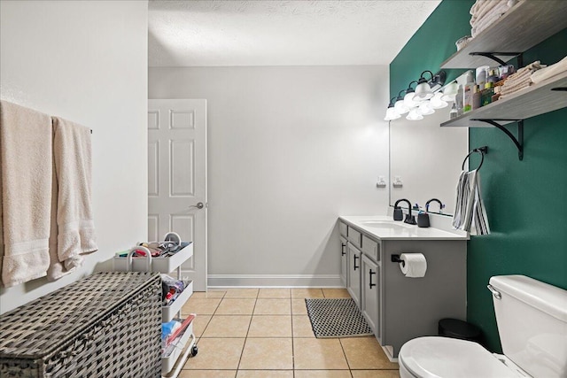 1008 Ramsey Branch Rd, Artemus, KY 40903 - bathroom featuring vanity, toilet, tile patterned flooring, and baseboards