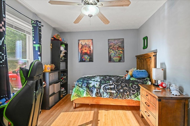 1008 Ramsey Branch Rd, Artemus, KY 40903 - bedroom featuring light wood-style flooring and ceiling fan
