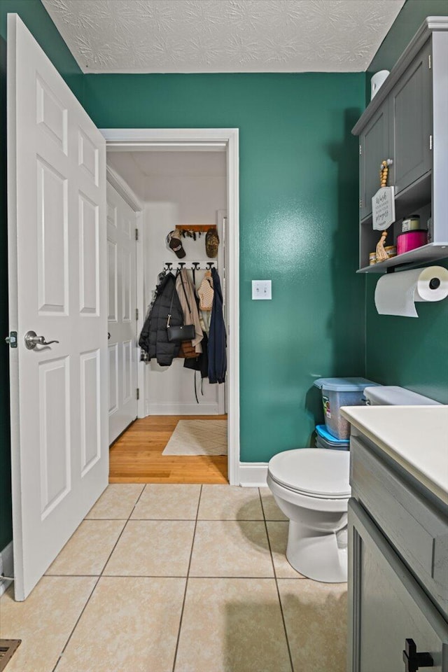 1008 Ramsey Branch Rd, Artemus, KY 40903 - bathroom featuring tile patterned flooring, vanity, toilet, and baseboards