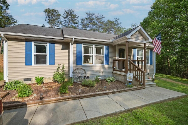 1008 Ramsey Branch Rd, Artemus, KY 40903 - view of front of property with crawl space, a shingled roof, and a porch