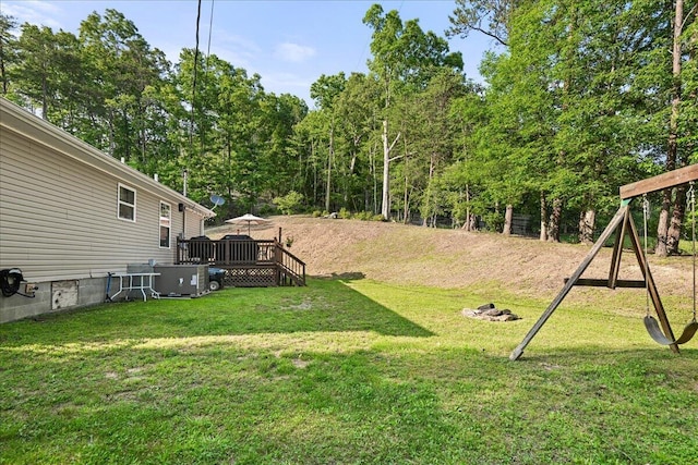 1008 Ramsey Branch Rd, Artemus, KY 40903 - view of green lawn featuring a wooden deck and central AC unit