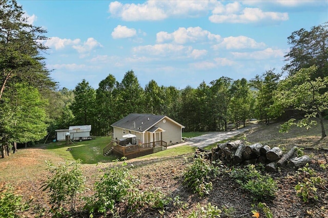 1008 Ramsey Branch Rd, Artemus, KY 40903 - rear view of property with a deck, a yard, and a view of trees