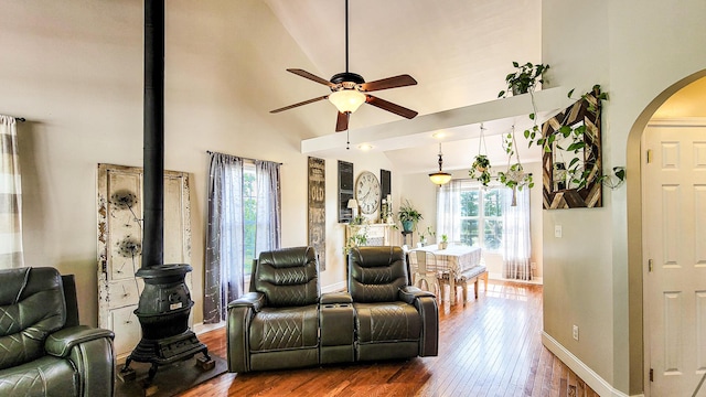 754 Countryside Cir, Mount Vernon, KY 40456 - living room featuring arched walkways, hardwood / wood-style flooring, a ceiling fan, high vaulted ceiling, and baseboards