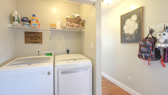 754 Countryside Cir, Mount Vernon, KY 40456 - laundry area featuring washer and dryer, wood finished floors, and baseboards