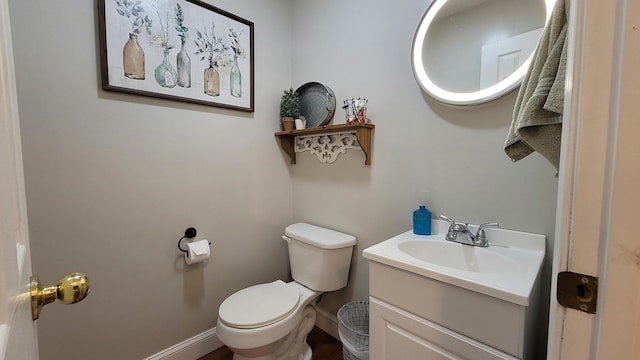754 Countryside Cir, Mount Vernon, KY 40456 - bathroom with toilet, vanity, and baseboards