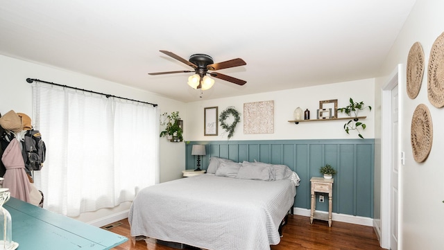754 Countryside Cir, Mount Vernon, KY 40456 - bedroom with wood finished floors, a ceiling fan, baseboards, and a wainscoted wall