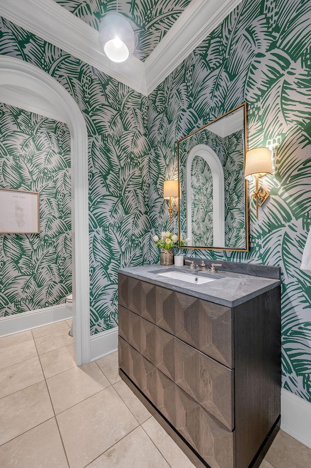 1617 Harmony Hall Ln, Lexington, KY 40502 - bathroom featuring wallpapered walls, baseboards, crown molding, vanity, and toilet