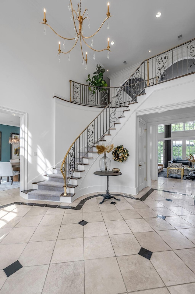 1617 Harmony Hall Ln, Lexington, KY 40502 - stairs with a high ceiling, tile patterned floors, baseboards, recessed lighting, and a chandelier