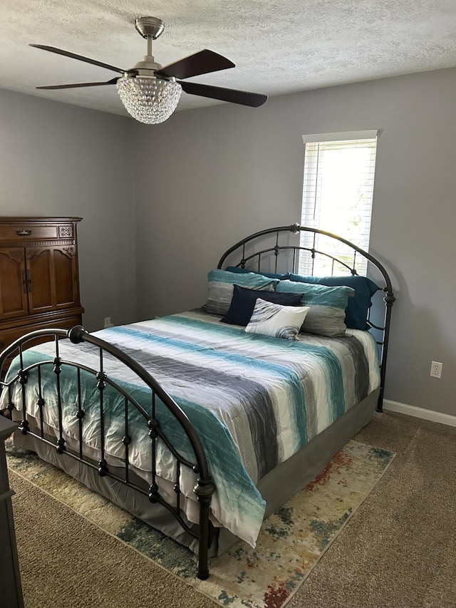609 Clintonville Rd, Winchester, KY 40391 - carpeted bedroom with a textured ceiling, ceiling fan, and baseboards
