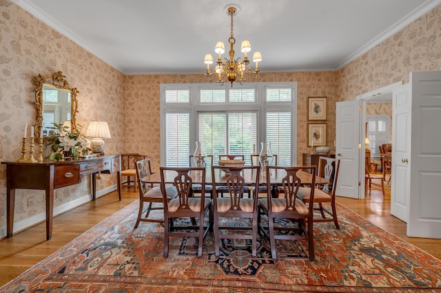 100 Idle Hour Dr Unit 8, Lexington, KY 40502 - dining room featuring wallpapered walls, a chandelier, wood finished floors, and ornamental molding