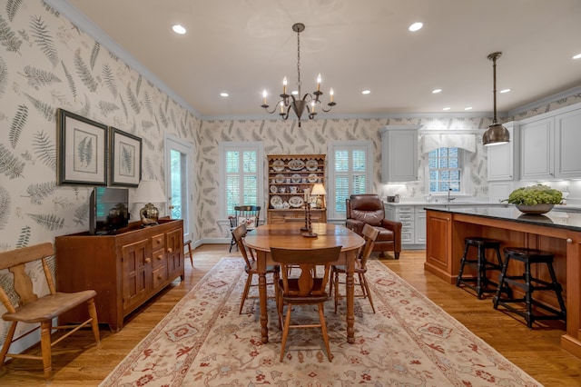 100 Idle Hour Dr Unit 8, Lexington, KY 40502 - dining area with a chandelier, crown molding, wallpapered walls, light wood-type flooring, and recessed lighting