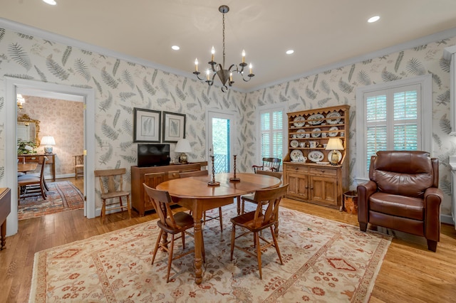 100 Idle Hour Dr Unit 8, Lexington, KY 40502 - dining space featuring wallpapered walls, a chandelier, light wood-type flooring, recessed lighting, and ornamental molding