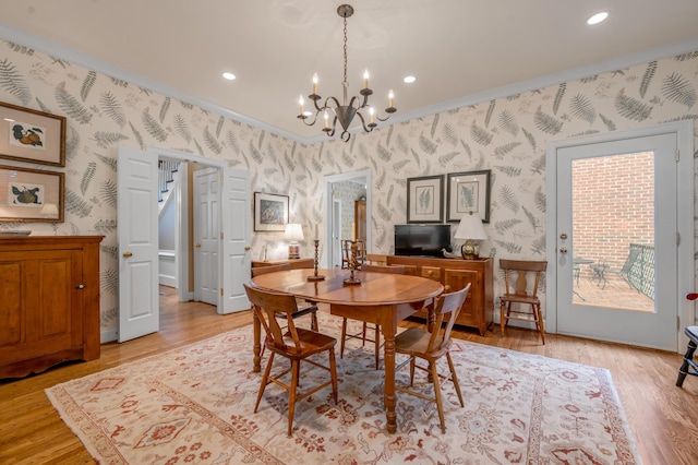 100 Idle Hour Dr Unit 8, Lexington, KY 40502 - dining area featuring wallpapered walls, a chandelier, light wood finished floors, recessed lighting, and ornamental molding