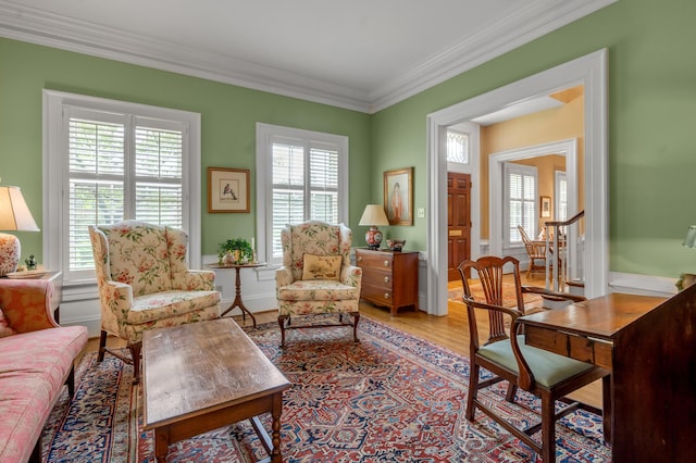 100 Idle Hour Dr Unit 8, Lexington, KY 40502 - living room featuring plenty of natural light, crown molding, and light wood-style floors