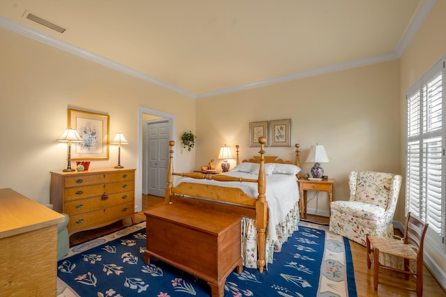 100 Idle Hour Dr Unit 8, Lexington, KY 40502 - bedroom with wood finished floors, crown molding, and baseboards