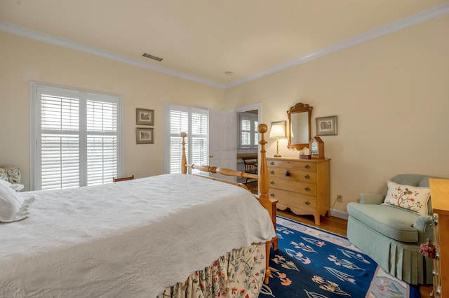 100 Idle Hour Dr Unit 8, Lexington, KY 40502 - bedroom with crown molding and wood finished floors