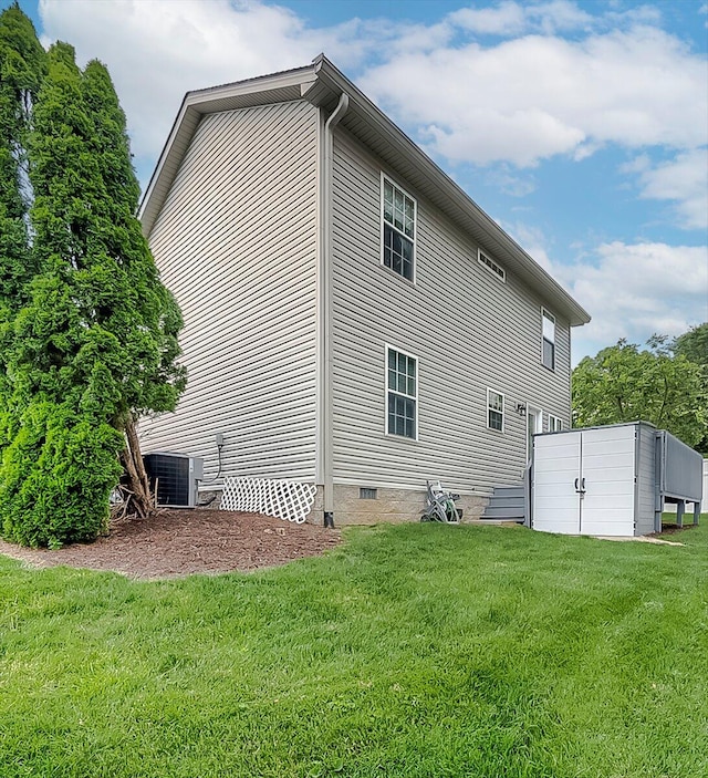 1202 Equestrian Way, Frankfort, KY 40601 - view of home's exterior featuring crawl space, a lawn, and cooling unit