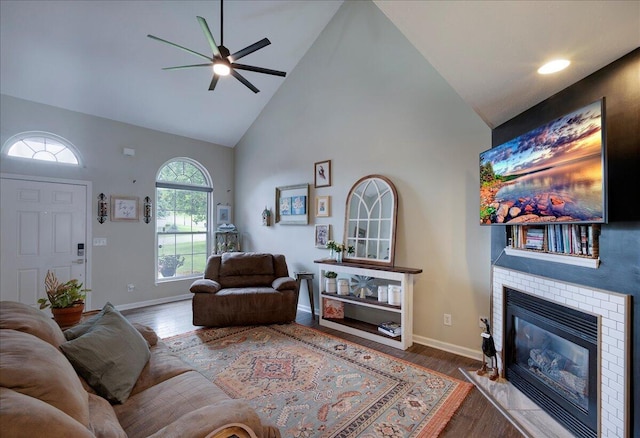 1202 Equestrian Way, Frankfort, KY 40601 - living room featuring high vaulted ceiling, ceiling fan, wood finished floors, baseboards, and a fireplace