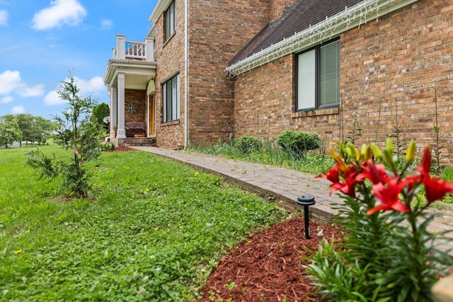 137 Indian Cave Subdivision, Monticello, KY 42633 - view of green lawn with a balcony