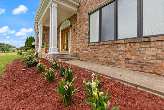 137 Indian Cave Subdivision, Monticello, KY 42633 - property entrance featuring brick siding and covered porch