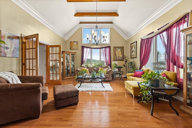 137 Indian Cave Subdivision, Monticello, KY 42633 - living area featuring a chandelier, light wood-type flooring, high vaulted ceiling, and ornamental molding