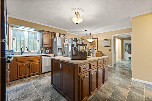 137 Indian Cave Subdivision, Monticello, KY 42633 - kitchen featuring stainless steel appliances, light countertops, stone tile flooring, a sink, and a kitchen island