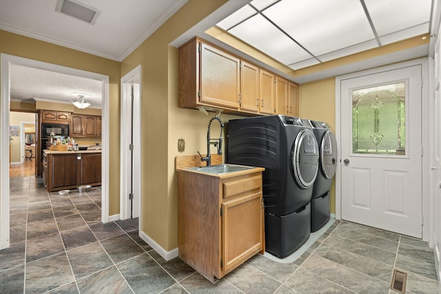 137 Indian Cave Subdivision, Monticello, KY 42633 - laundry area featuring independent washer and dryer, ornamental molding, cabinet space, baseboards, and stone finish flooring