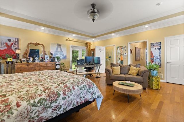 137 Indian Cave Subdivision, Monticello, KY 42633 - bedroom featuring wood finished floors, a tray ceiling, crown molding, and recessed lighting