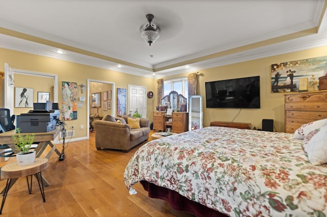 137 Indian Cave Subdivision, Monticello, KY 42633 - bedroom featuring light wood-style flooring, a raised ceiling, ornamental molding, a desk, and recessed lighting